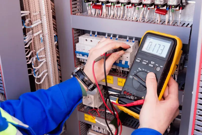 Electrician Testing A circuit box